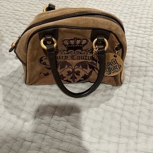 Juicy Couture hand bag in a very good condition